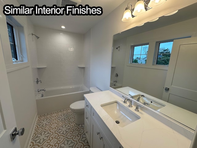 full bathroom featuring shower / bathing tub combination, tile patterned flooring, vanity, and toilet