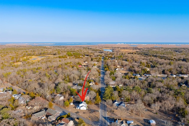 aerial view featuring a view of trees