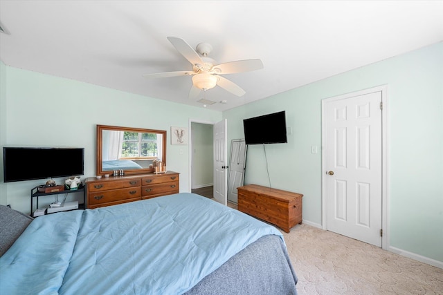 carpeted bedroom featuring ceiling fan