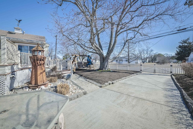 view of street featuring a gate