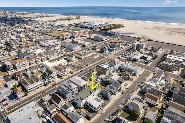 aerial view featuring a beach view and a water view