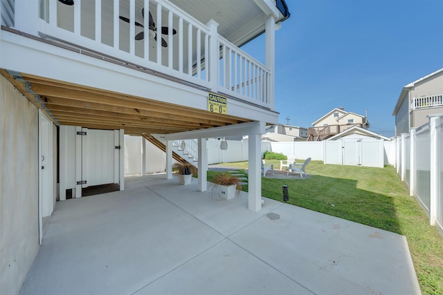 view of patio featuring a fenced backyard and stairs