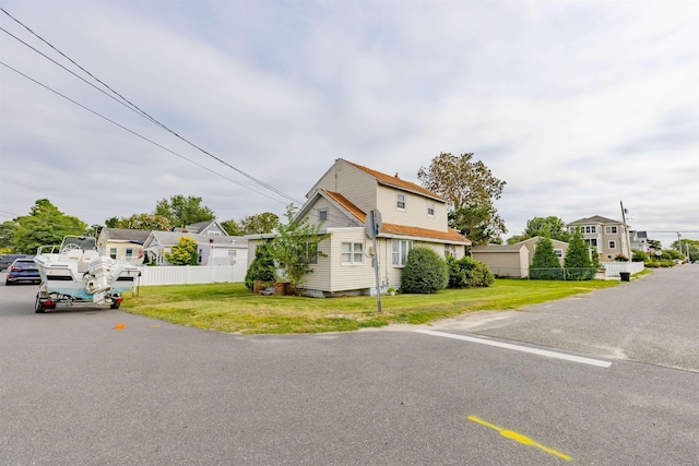 view of front of home with a front lawn