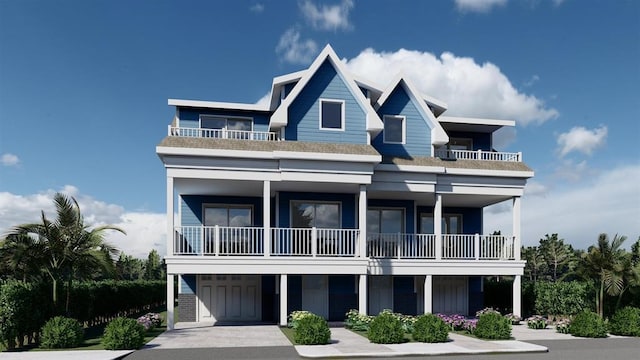 coastal home featuring a balcony