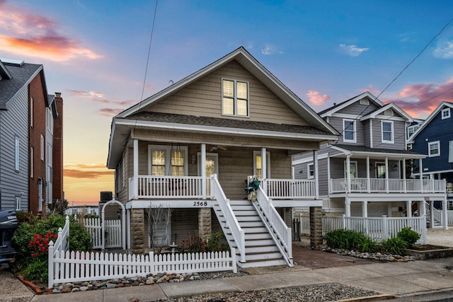 2568 Ocean Dr, Avalon, NJ 08202 - coastal inspired home with a porch, stairs, and roof with shingles