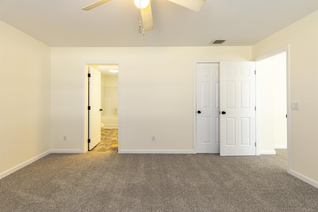 unfurnished bedroom with carpet, ceiling fan, and a closet