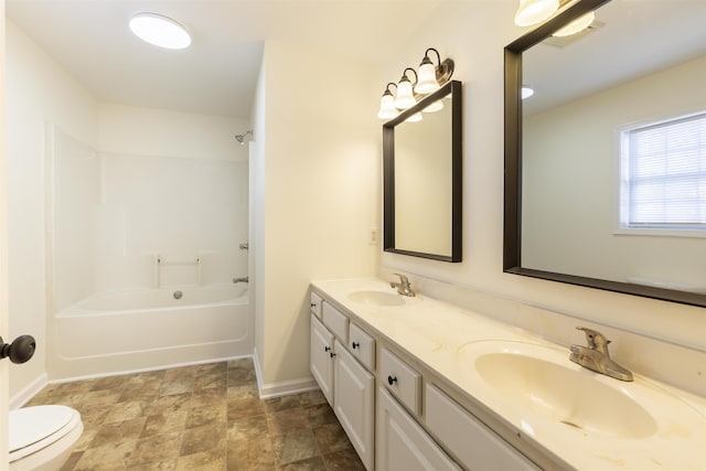 full bathroom with vanity, shower / bathtub combination, and toilet