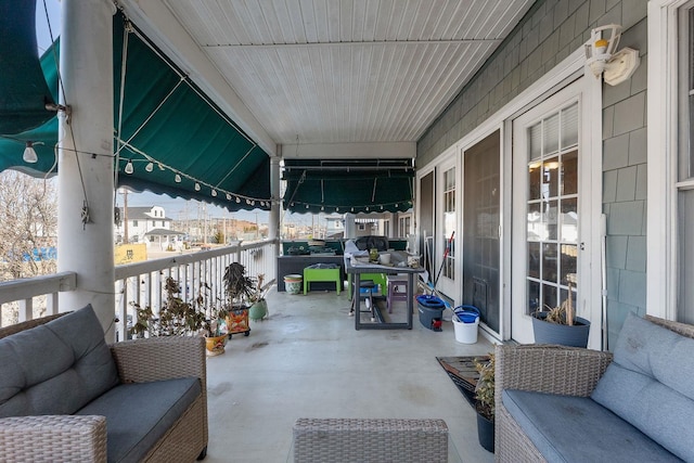 view of patio / terrace with a balcony