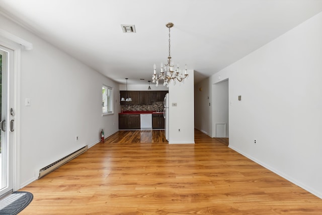 1 Cypress Ct, Rio Grande, NJ 08242 - unfurnished dining area featuring baseboard heating, a chandelier, light wood-style flooring, and baseboards