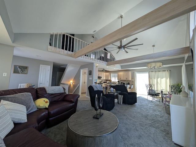 6 Pierces Point Rd, Cape May Court House, NJ 08210 - living area with light colored carpet, high vaulted ceiling, ceiling fan, a chandelier, and stairs