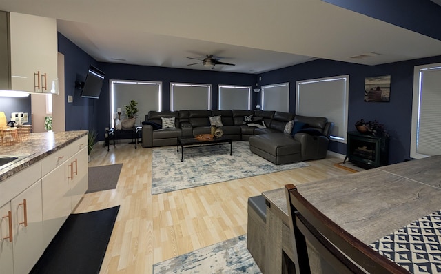 6 Pierces Point Rd, Cape May Court House, NJ 08210 - living room featuring light wood-style flooring and ceiling fan