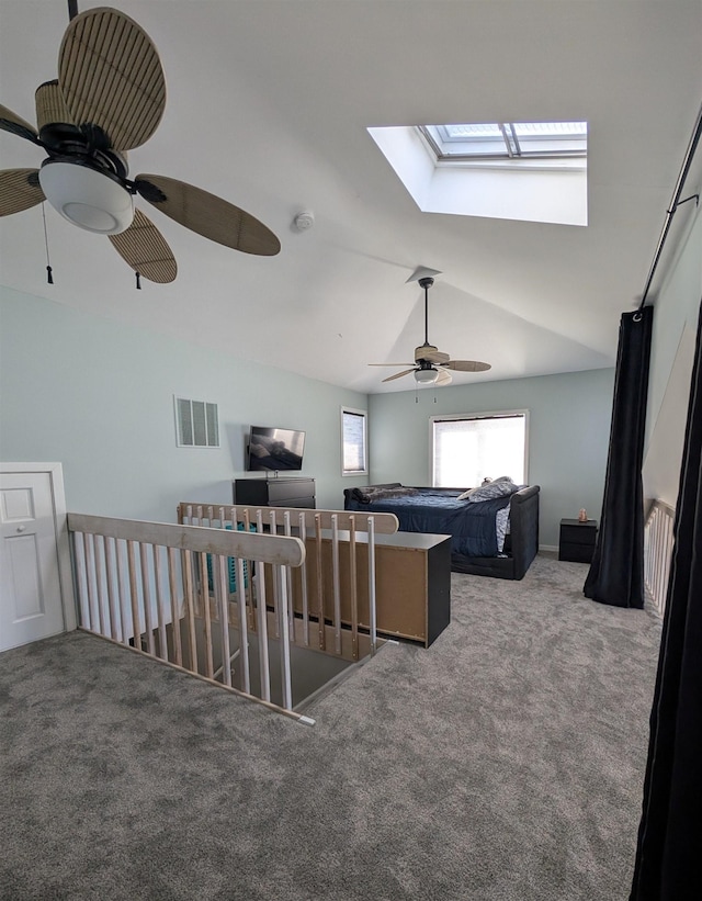 6 Pierces Point Rd, Cape May Court House, NJ 08210 - living area featuring carpet, a skylight, ceiling fan, and lofted ceiling