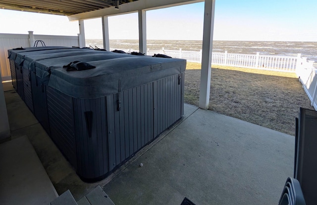 6 Pierces Point Rd, Cape May Court House, NJ 08210 - fenced backyard featuring view of water and beach, a hot tub, and a patio