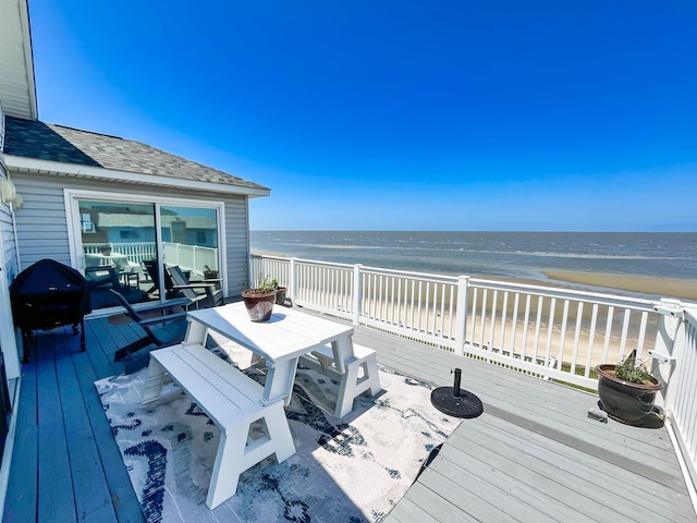 6 Pierces Point Rd, Cape May Court House, NJ 08210 - wooden terrace featuring outdoor dining area and view of water and beach
