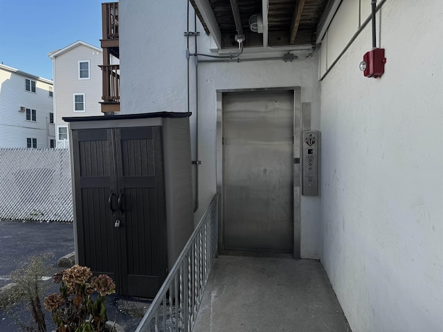 view of exterior entry featuring elevator