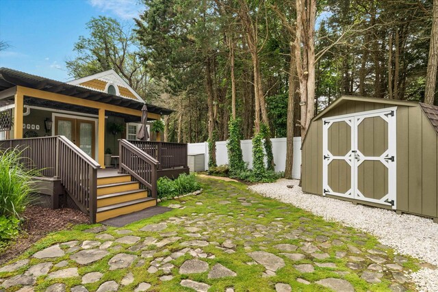 2068 N Shore Rd, Clermont, NJ 08210 - view of yard with a shed, french doors, and a wooden deck