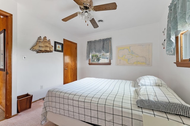 bedroom featuring carpet and ceiling fan