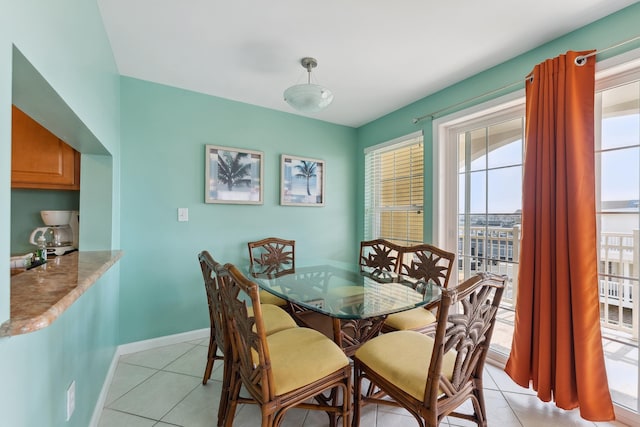 view of tiled dining space