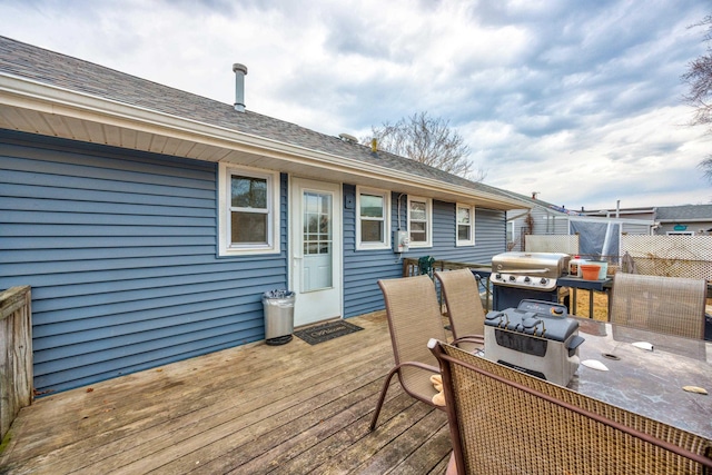 wooden deck featuring fence and grilling area