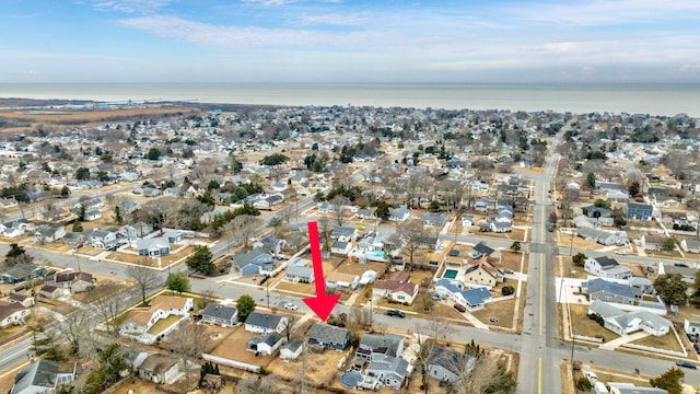 aerial view featuring a water view and a residential view