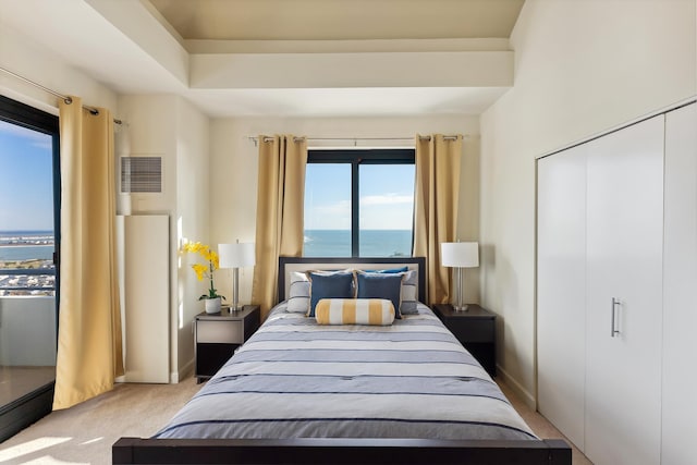 526 Pacific Ave Unit 2604, Atlantic City, NJ 08401 - bedroom with light carpet, visible vents, a closet, and a water view