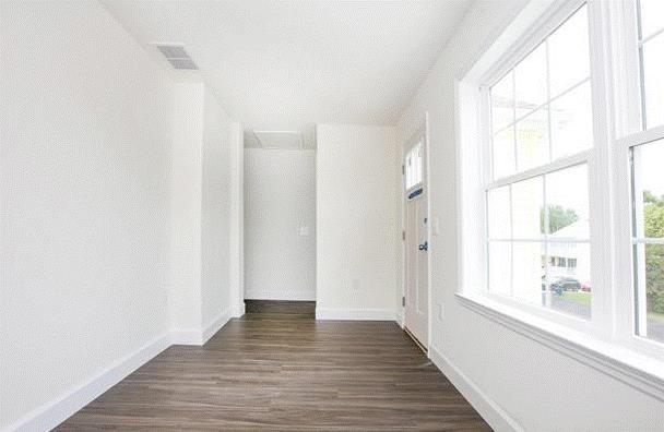 interior space featuring dark wood-type flooring