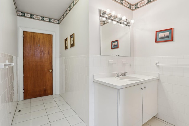 102 S Derby Ave, Ventnor, NJ 08406 - bathroom featuring tile walls, vanity, a wainscoted wall, and tile patterned flooring