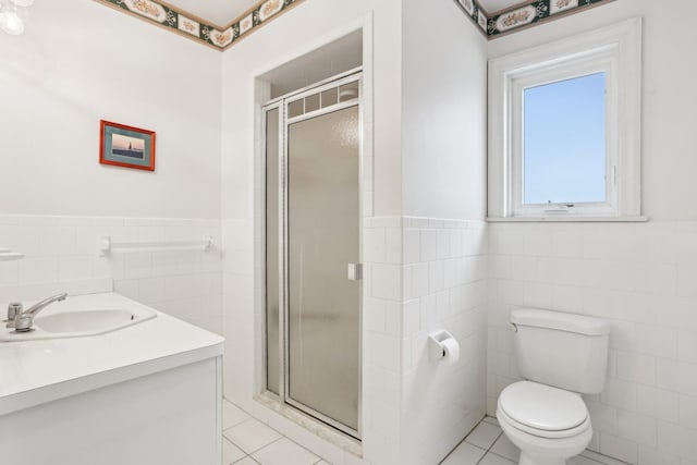102 S Derby Ave, Ventnor, NJ 08406 - bathroom featuring tile walls, a stall shower, tile patterned flooring, vanity, and wainscoting