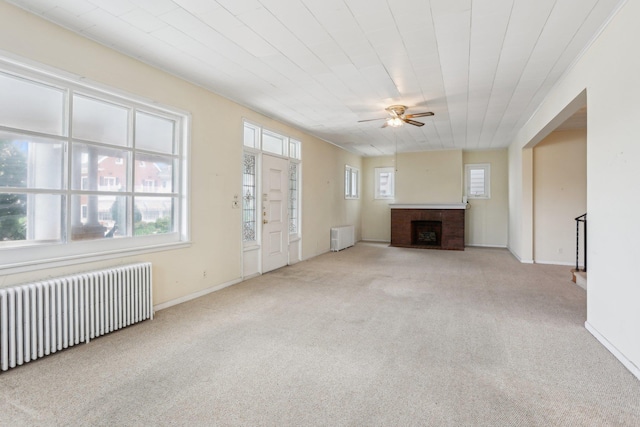 102 S Derby Ave, Ventnor, NJ 08406 - unfurnished living room featuring radiator heating unit, plenty of natural light, and carpet floors