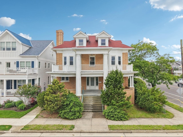102 S Derby Ave, Ventnor, NJ 08406 - view of front of property featuring a balcony, brick siding, and a chimney