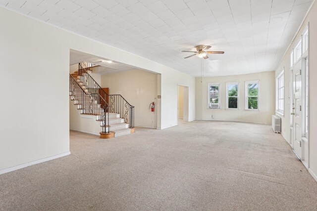 102 S Derby Ave, Ventnor, NJ 08406 - unfurnished living room with light carpet, a ceiling fan, stairway, and radiator