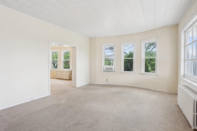 102 S Derby Ave, Ventnor, NJ 08406 - unfurnished room with radiator, light colored carpet, and ornamental molding