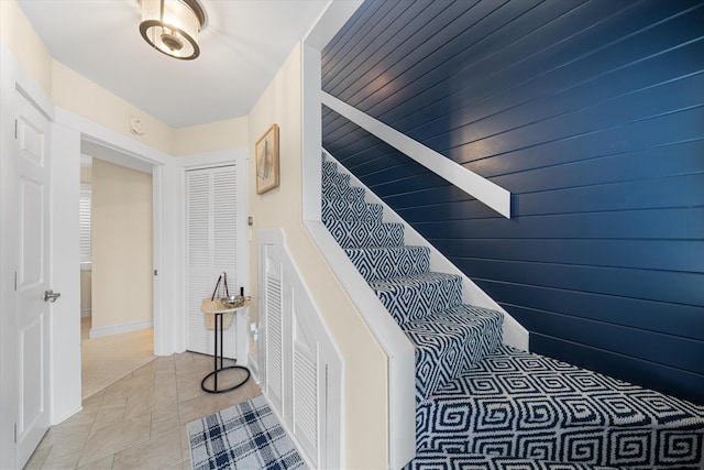 13 93rd St Unit 5, Stone Harbor, NJ 08247 - stairway with baseboards and tile patterned floors