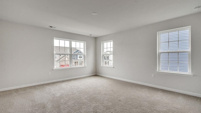 empty room with carpet floors