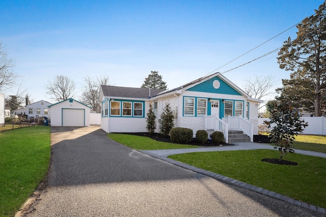 134 Pinetree Dr, Villas, NJ 08251 - ranch-style house featuring a garage, an outdoor structure, and a front yard