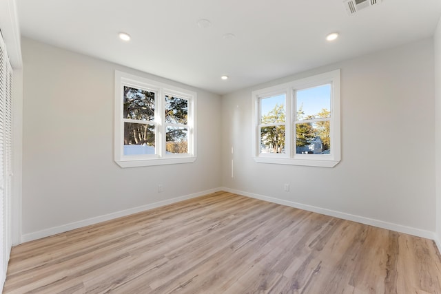 empty room with light wood-type flooring