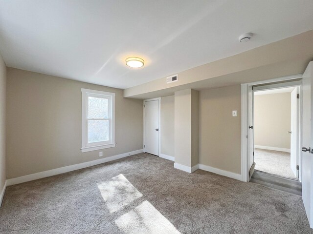 unfurnished bedroom with carpet