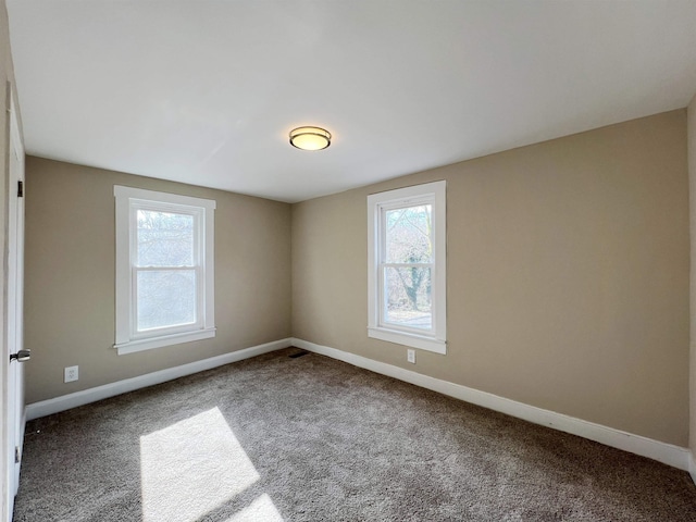 view of carpeted spare room