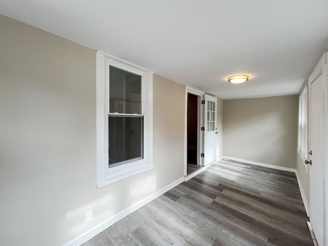 empty room featuring dark hardwood / wood-style floors