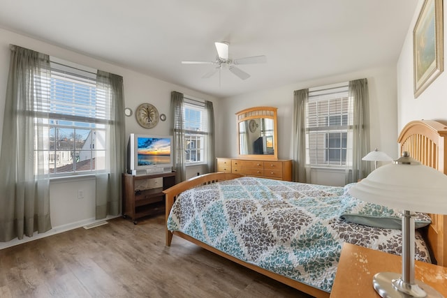 bedroom featuring ceiling fan and hardwood / wood-style floors