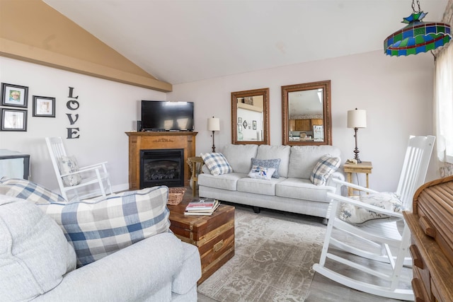 living room with wood-type flooring and lofted ceiling