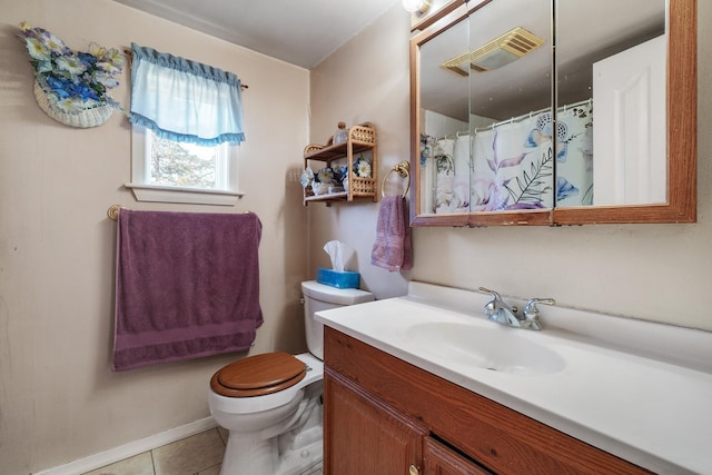 full bath featuring vanity, a shower with curtain, visible vents, tile patterned floors, and toilet