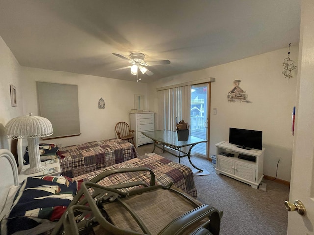 bedroom featuring ceiling fan, carpet floors, and access to outside