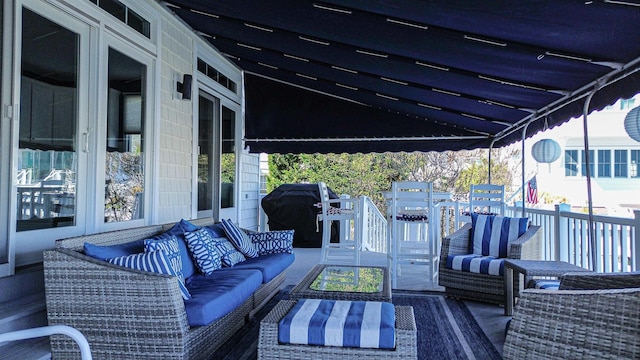 view of patio / terrace featuring an outdoor living space and area for grilling