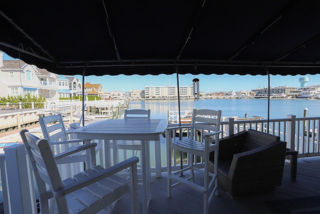 dock area with a water view