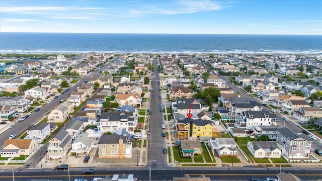 aerial view with a residential view and a water view