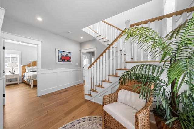 283 85th St, Stone Harbor, NJ 08247 - stairway with wood finished floors, wainscoting, and recessed lighting
