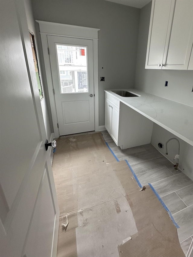 laundry room with a sink