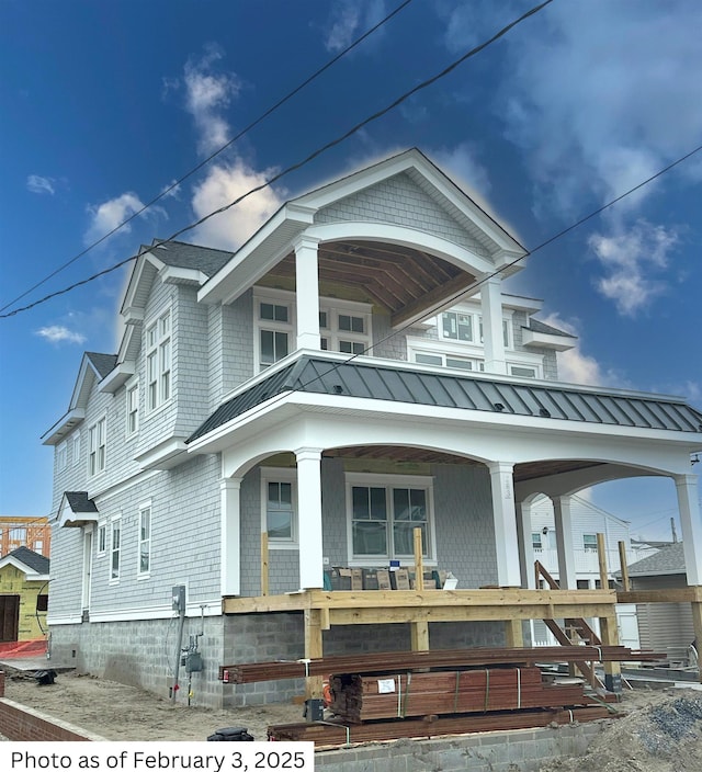 view of home's exterior featuring a porch