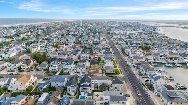 aerial view featuring a residential view and a water view